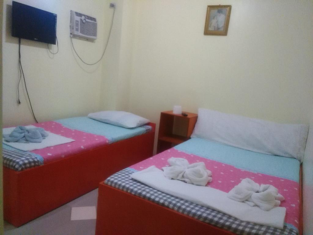 Aranas-Carillo Travellers Inn Kalibo Zimmer foto